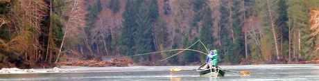 Fly fishermen nymphing in drift boat on Olympic Peninsula river